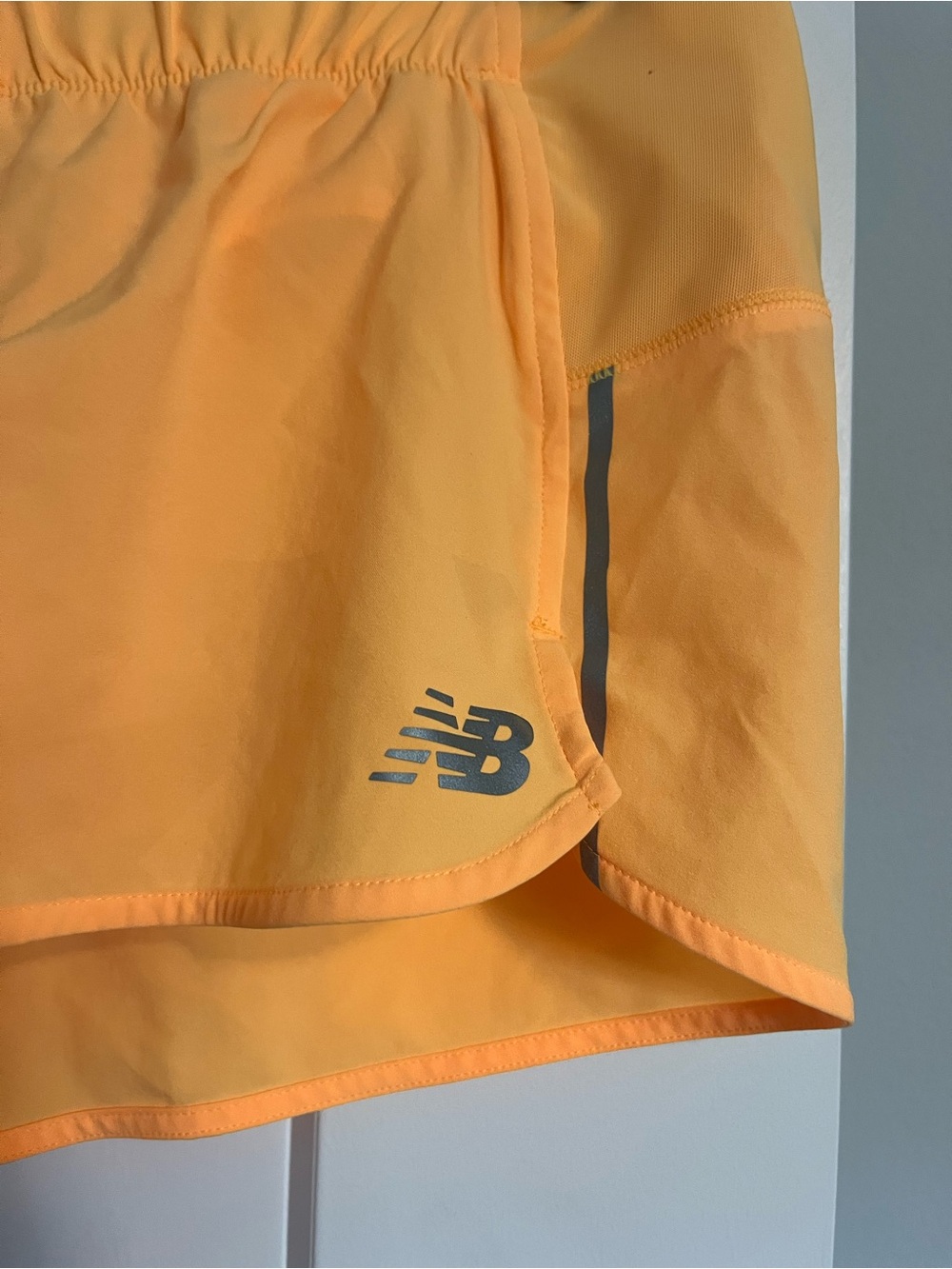 New Balance. Bright Peach Lightweight Athletic Running Shorts - Picture 3 of 5